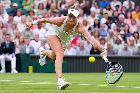 Marketa Vondrousova plays a forehand return